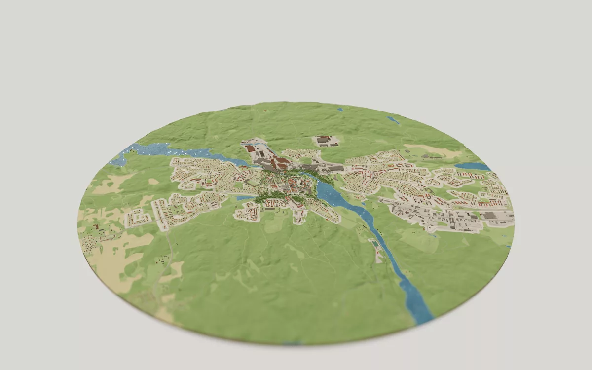 3D-kartan över Finspång sedd snett ovanifrån, med hus, gator, vatten och grönytor.