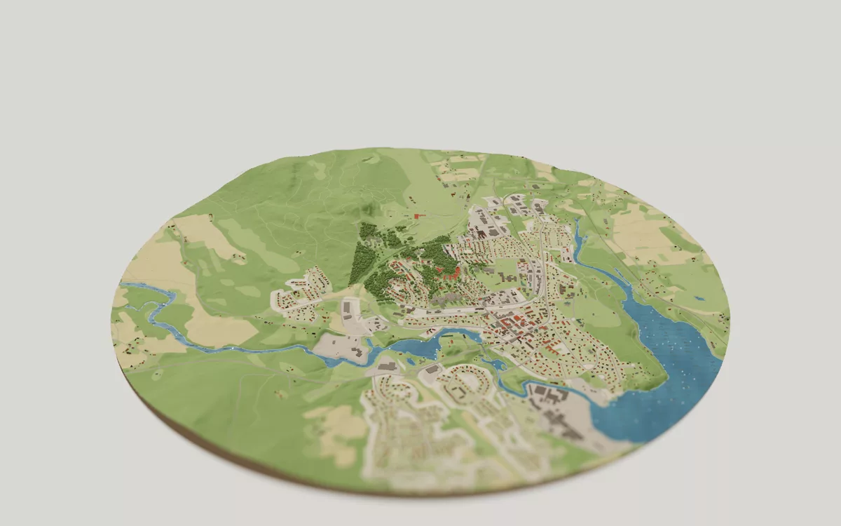 3D-kartan över Torsby sedd snett ovanifrån, med hus, gator, vatten och grönytor.