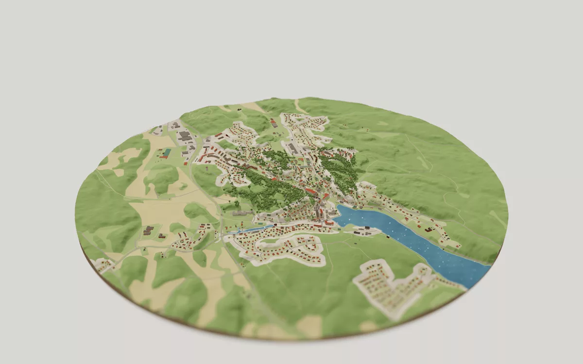 3D-kartan över Valdemarsvik sedd snett ovanifrån, med hus, gator, vatten och grönytor.